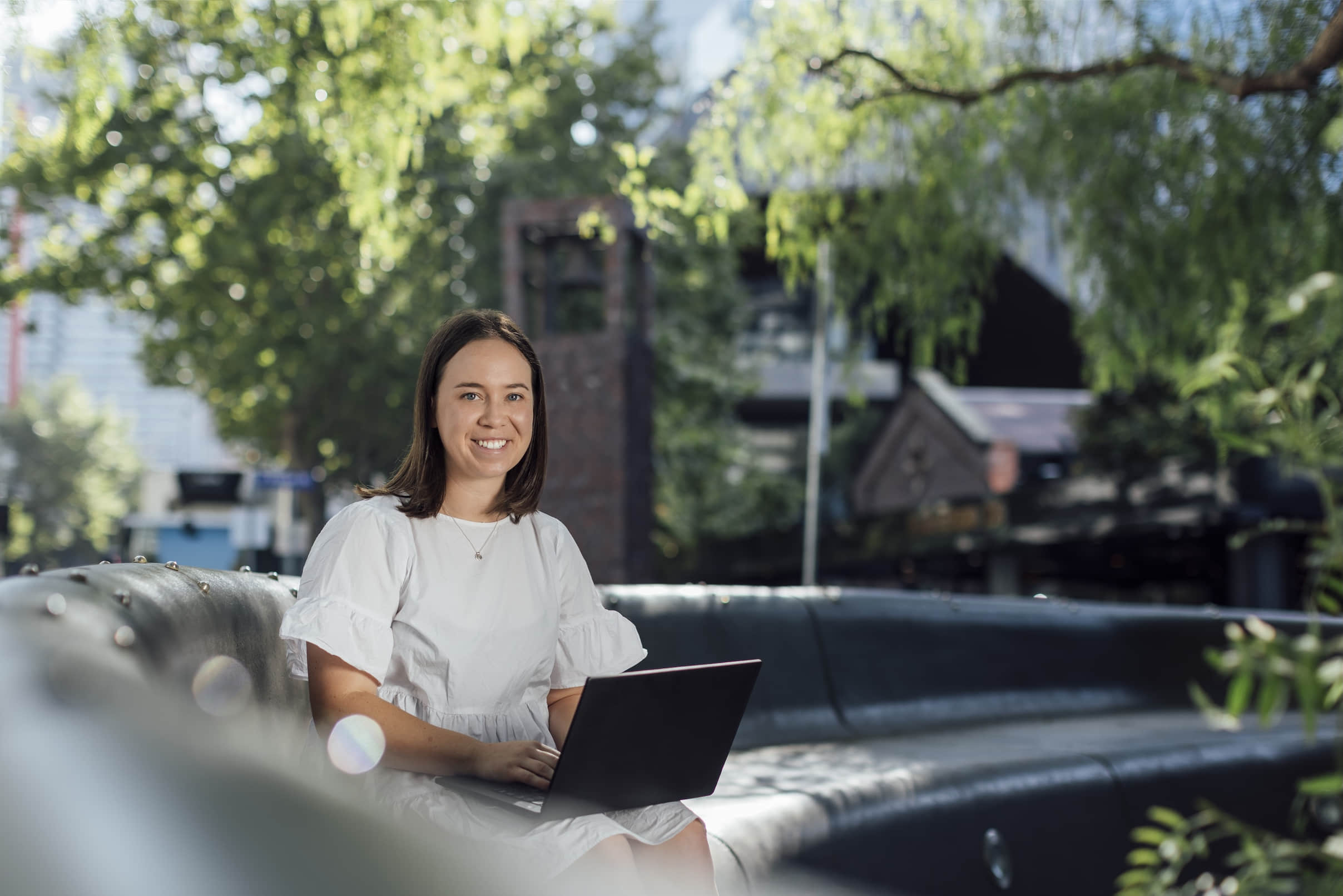 girl remote working outside