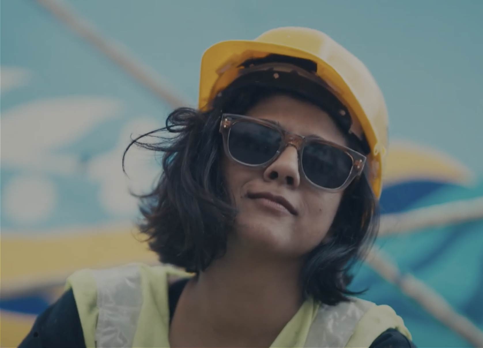 Woman smiling video thumbnail.