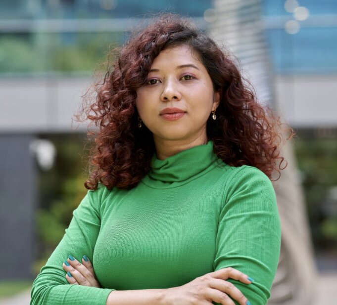 woman in a green blouse